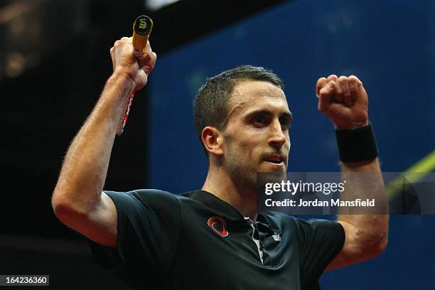 Peter Barker of England celebrates after beating Nick Matthew of England in their semi-final match in the Canary Wharf Squash Classic on March 21,...