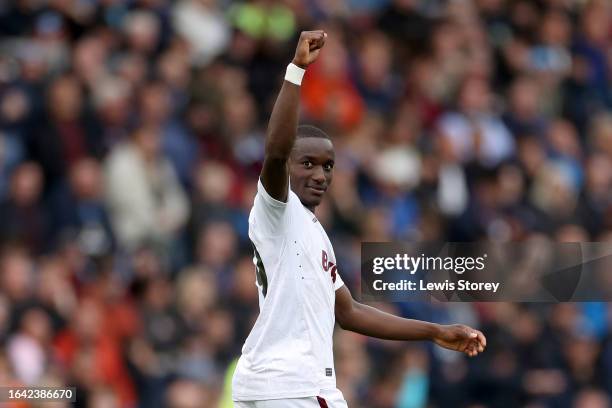 Moussa Diaby of Aston Villa celebrates after scoring the team's third goal during the Premier League match between Burnley FC and Aston Villa at Turf...