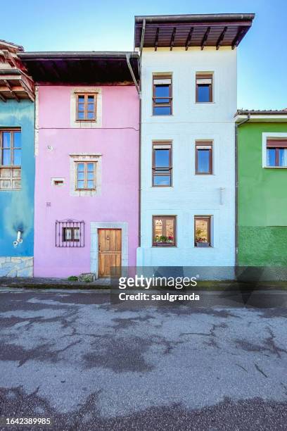 colorful houses in llanes - fachada arquitectónica stock-fotos und bilder