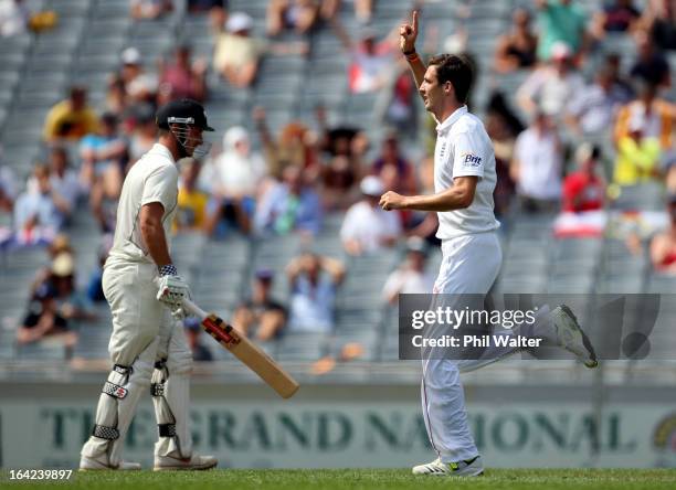 Steven Finn of England celebrates his wicket of Hamish Rutherford of New Zealand during day one of the Third Test match between New Zealand and...