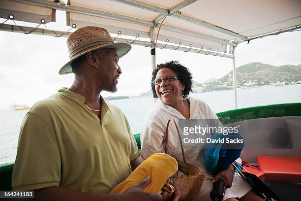 couple on a boat - antilles stock pictures, royalty-free photos & images