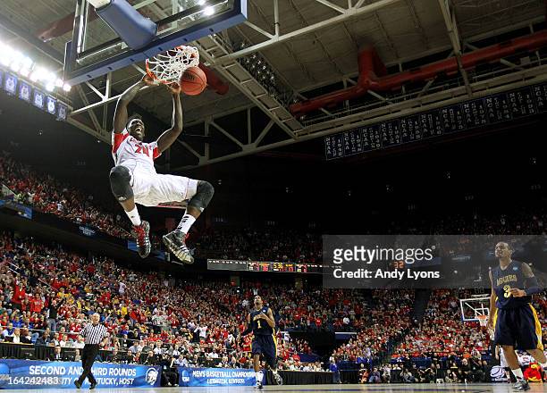 Montrezl Harrell of the Louisville Cardinals dunks against the North Carolina A&T Aggies during the second round of the 2013 NCAA Men's Basketball...