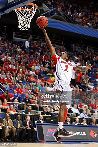Russ Smith of the Louisville Cardinals goes to the hoop against the North Carolina A&T Aggies during the second round of the 2013 NCAA Men's...