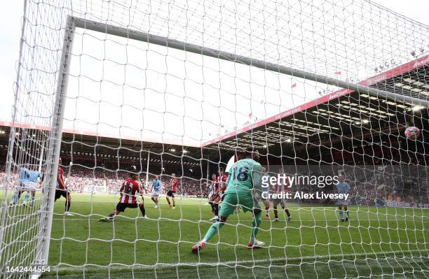 Rodri of Manchester City scores their sides second goal during the Premier League match between Sheffield United and Manchester City at Bramall Lane...