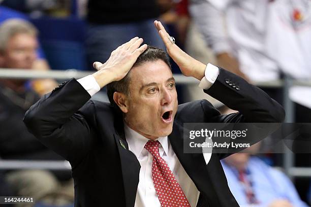 Head coach Rick Pitino of the Louisville Cardinals shouts from the sidelines against the North Carolina A&T Aggies during the second round of the...