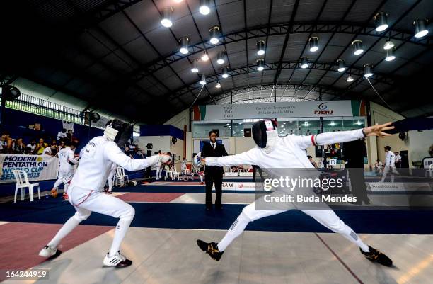 Adam Marosi of Hungary competes against Lucas Martinez of Brazil in the Men's Pentathlon during the Modern Pentathlon World Cup Series 2013 at...