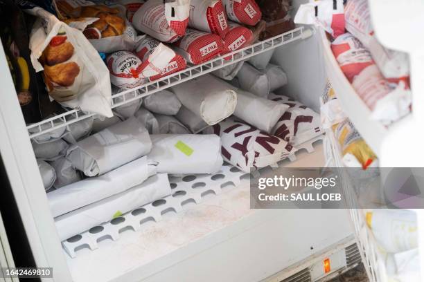 Frozen game meat is seen in the freezer of Taylor Chamberlin, an urban deer hunter with the goal of dealing with overpopulation in urban areas, at...