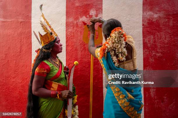 a devotee getting ready to head to temple after makeover into goddess kali. - kaveripattinam stock pictures, royalty-free photos & images