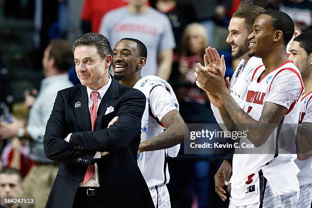 Head coach Rick Pitino of the Louisville Cardinals smiles from the sidelines against the North Carolina A&T Aggies during the second round of the...