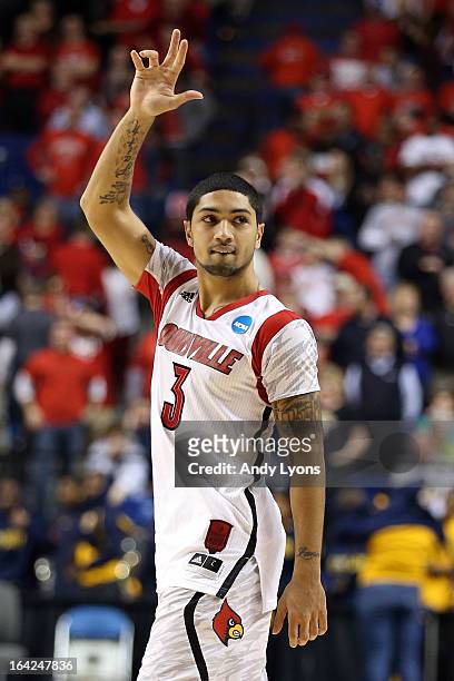 Peyton Siva of the Louisville Cardinals reacts after defeating the North Carolina A&T Aggies during the second round of the 2013 NCAA Men's...