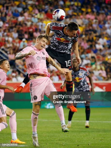 Robert Taylor of Inter Miami defends against Sean Nealis of New York Red Bulls at Red Bull Arena on August 26, 2023 in Harrison, New Jersey.