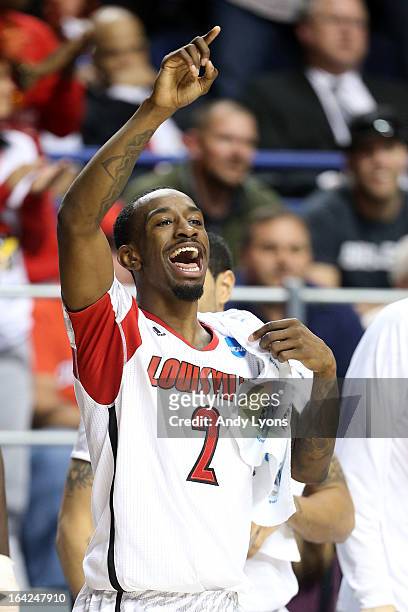 Russ Smith of the Louisville Cardinals reacts towards the end of the game against the North Carolina A&T Aggies during the second round of the 2013...