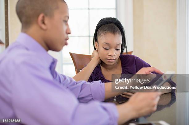 teens at home with smartphone and digital tablet - 1638 stock pictures, royalty-free photos & images