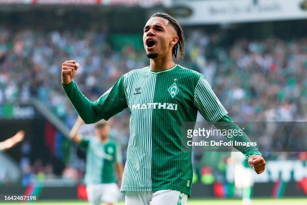 Justin Njinmah of SV Werder Bremen celebrates after scoring his teams fourth goal during the Bundesliga match between SV Werder Bremen and 1. FSV...