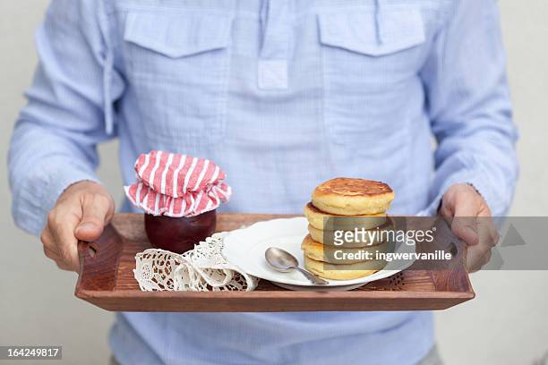 man with pancakes with jam - man tray food holding stock pictures, royalty-free photos & images