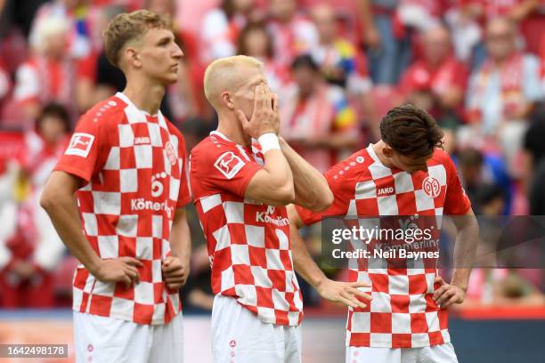 Anthony Caci and team mates of 1.FSV Mainz 05 react after the Bundesliga match between 1. FSV Mainz 05 and Eintracht Frankfurt at MEWA Arena on...