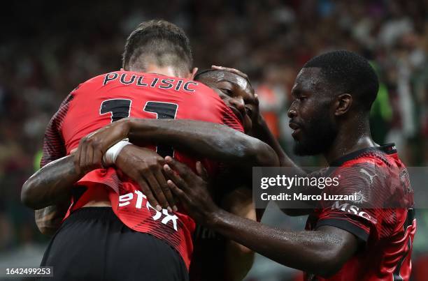 Christian Pulisic of AC Milan celebrates with his team-mate Rafael Leaoafter scoring the team's first goal during the Serie A TIM match between AC...