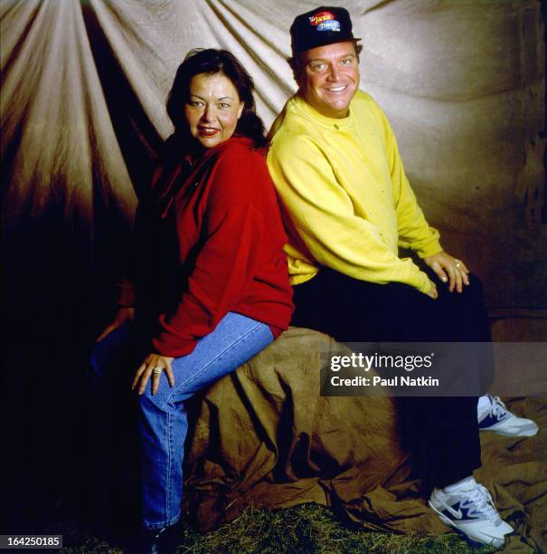 Portrait of married couple, actors Roseanne Barr and Tom Arnold backstage at Farm Aid, Ames, Iowa , March 14, 1992.
