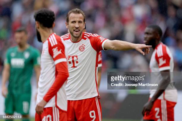 Harry Kane of Bayern Munich points instructions during the Bundesliga match between FC Bayern München and FC Augsburg at Allianz Arena on August 27,...