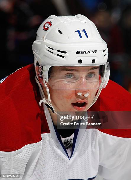 Brendan Gallagher of the Montreal Canadiens shows the effects of a hit late in the third period against the New York Islanders at the Nassau Veterans...