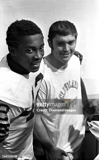 Wide receiver Paul Warfield and quarterback Bill Nelsen of the Cleveland Browns pose for a picture together after a playoff game against the Dallas...