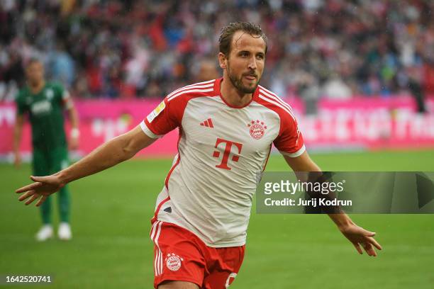 Harry Kane of Bayern Munich celebrates after scoring the team's second goal from the penalty-spot during the Bundesliga match between FC Bayern...