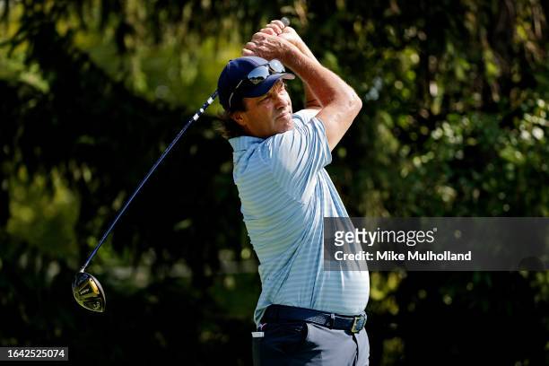 Stephen Ames of Canada hits a tee shot on the second hole during the final round of the The Ally Challenge presented by McLaren at Warwick Hills Golf...