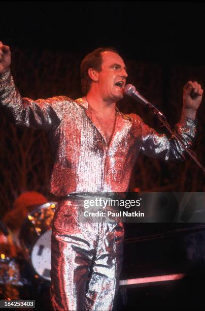 Australian musician Peter Allen performs on stage at Park West, Chicago, Illinois, November 24, 1980.