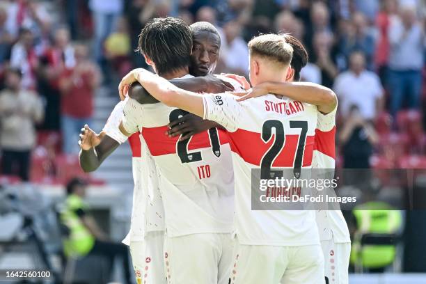 Serhou Guirassy of VfB Stuttgart celebrates after scoring his team's third goal with teammates during the Bundesliga match between VfB Stuttgart and...