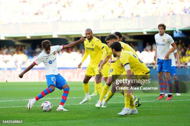 Lamine Yamal of FC Barcelona takes a shot on goal during the LaLiga EA Sports match between Villarreal CF and FC Barcelona at Estadio de la Ceramica...