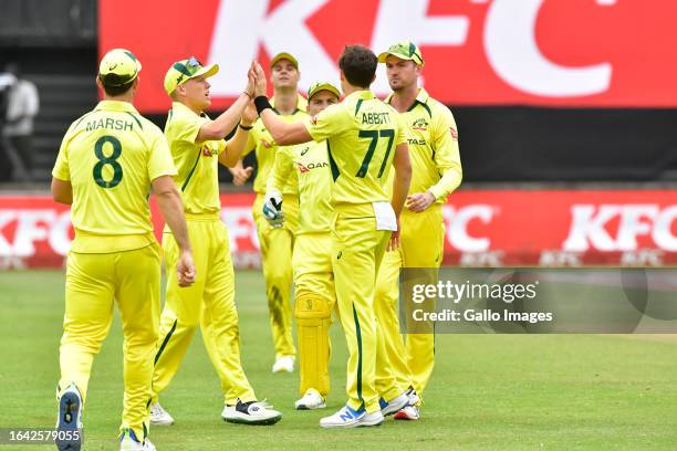Australian players celebrate the dismissal of Aiden Markram of South Africa during the 3rd KFC T20 International match between South Africa and...