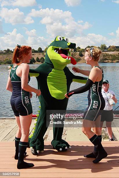Erica Taylor and Emma Dyke of Craighead Diocesan School celebrate with the mascot after wiining silver in the girls U18 coxless pair during day five...