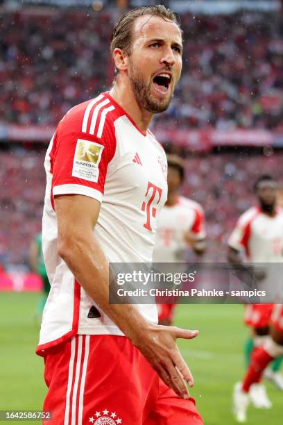 Harry Kane of FC Bayern Muenchen celebrates after scoring his team's second goal during the Bundesliga match between FC Bayern München and FC...