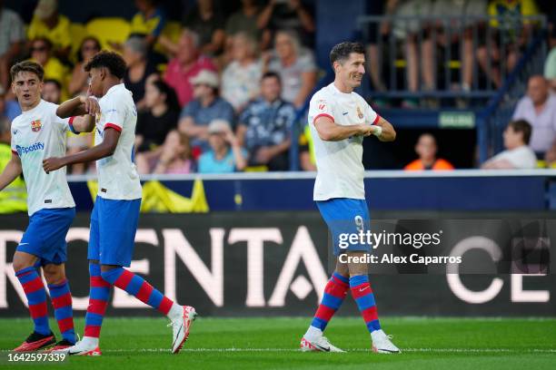 Robert Lewandowski of FC Barcelona celebrates after scoring the team's fourth goal during the LaLiga EA Sports match between Villarreal CF and FC...