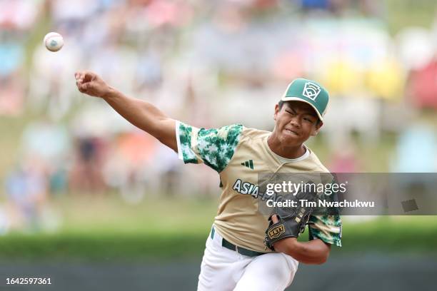 Fan Chen-Jun of the Asia-Pacific Region team from Taipei City, Chinese Taipei pitches during the first inning against the Southwest Region team from...