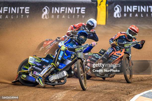 Jason Doyle leads Mikkel Michelsen and Steve Worrall during the FIM Speedway Grand Prix of Great Britain at the Principality Stadium, Cardiff on...