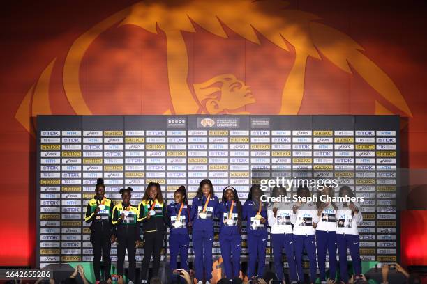 Silver medalists Shericka Jackson, Sashalee Forbes, and Natasha Morrison of Team Jamaica, gold medalists Sha'Carri Richardson, Gabrielle Thomas,...
