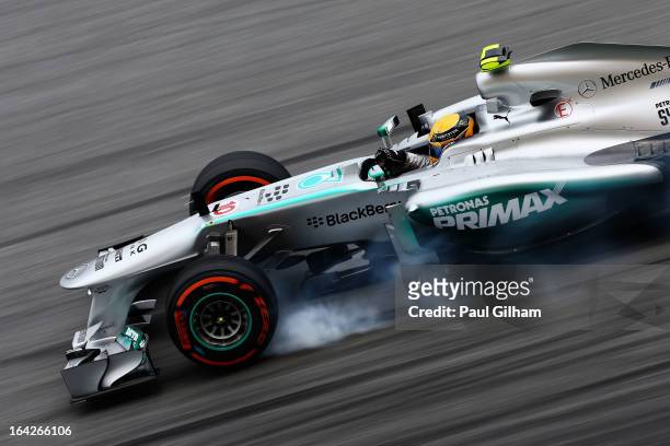 Lewis Hamilton of Great Britain and Mercedes GP drives during practice for the Malaysian Formula One Grand Prix at the Sepang Circuit on March 22,...
