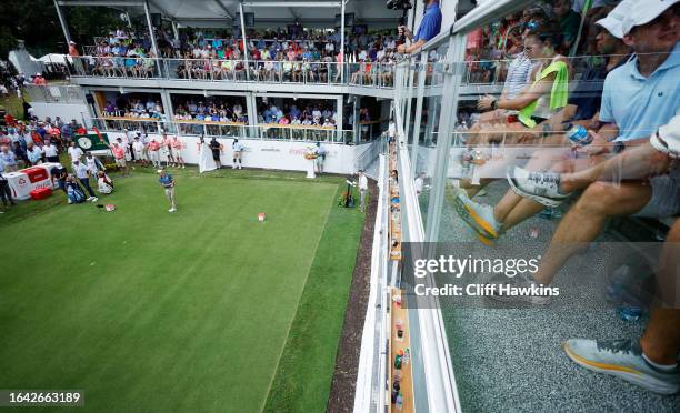 Collin Morikawa of the United States plays his shot from the first tee during the final round of the TOUR Championship at East Lake Golf Club on...