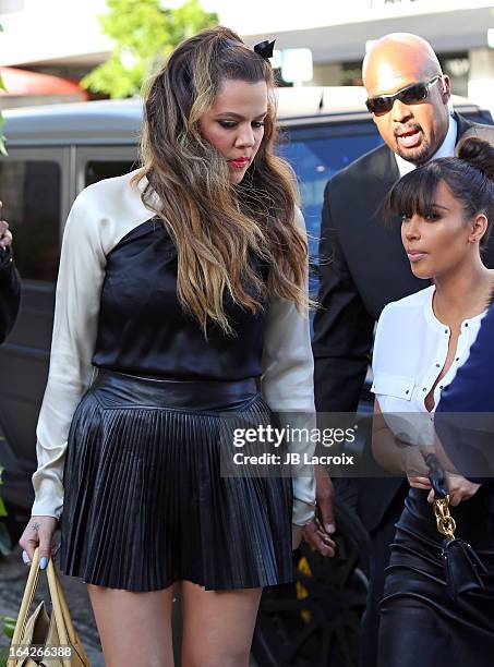 Khloe Kardashian and Kim Kardashian are seen on March 21, 2013 in Los Angeles, California.