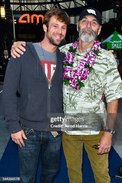 Wes Brown and film maker Jack McCoy arrive at Disney's 'A Deeper Shade Of Blue' surfing documentary premiere at AMC Downtown Disney 12 Theater on...