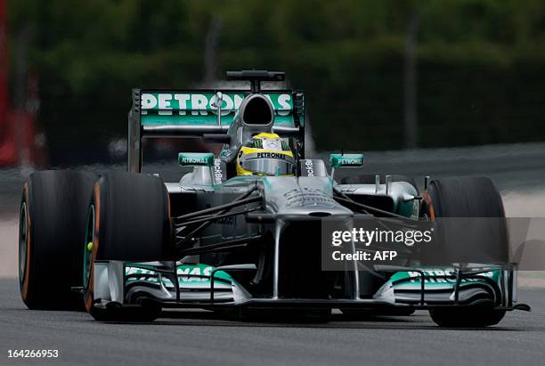 Mercedes driver Nico Rosberg of Germany steers his car during the second practice session ahead of the Formula One Malaysian Grand Prix at Sepang on...