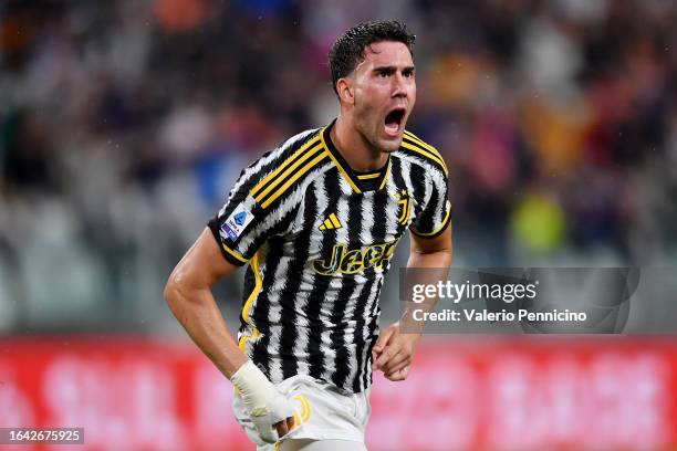 Dusan Vlahovic of Juventus celebrates after scoring their sides first goal during the Serie A TIM match between Juventus and Bologna FC at Allianz...