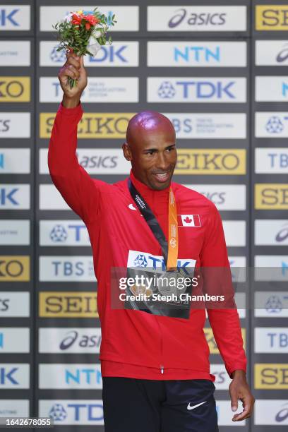 Silver medalist Damian Warner of Team Canada poses for a photo during the medal ceremony for the Men's Heptathlon during day nine of the World...