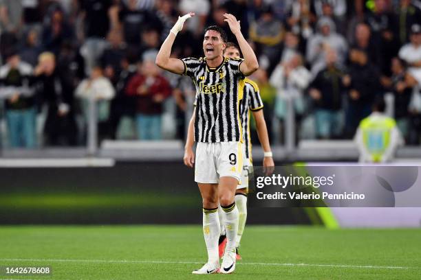 Dusan Vlahovic of Juventus celebrates after scoring their sides first goal during the Serie A TIM match between Juventus and Bologna FC at Allianz...