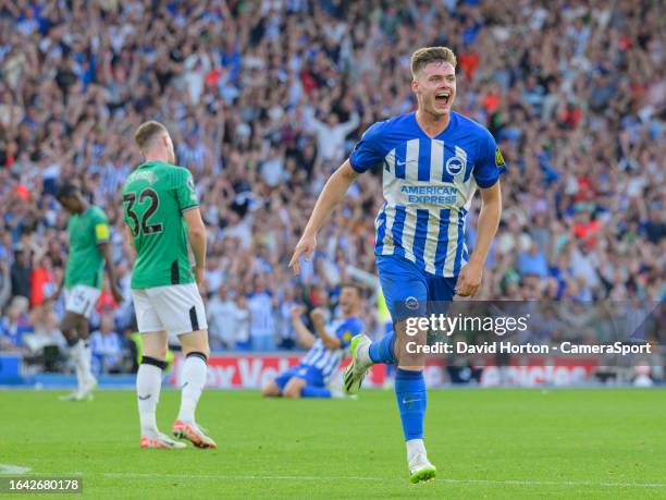 Brighton & Hove Albion's Evan Ferguson celebrates scoring his side's second goal during the Premier League match between Brighton & Hove Albion and...