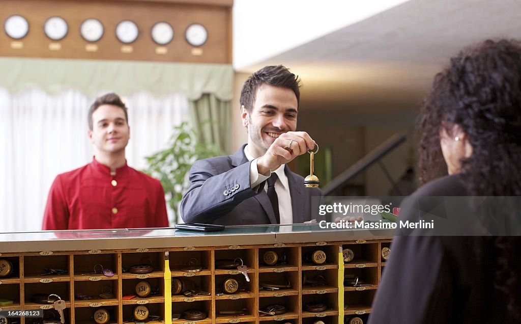 Businessman checking in to a hotel