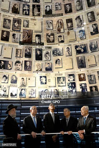 In this handout photograph supplied by the Government Press Office of Israel , U.S. President Barack Obama visits the Hall of Names at the Yad Vashem...