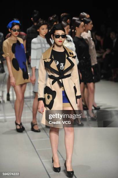 Models showcase designs on the runway at the Et Momonakia show during Mercedes Benz Fashion Week Tokyo Autumn/Winter 2013/14 at Shibuya Hikarie...