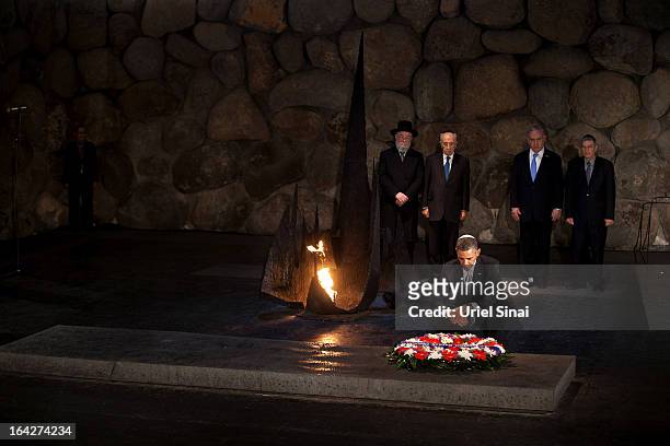 President Barack Obama pays his respects in the Hall of Remembrance in front of Israel's President Shimon Peres, Israel's Prime Minster Benjamin...